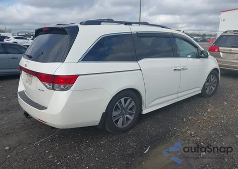 2016 Honda Odyssey Touring/Touring Elite z USA, uszkodzony, nr VIN 5FNRL5H9XGB014319